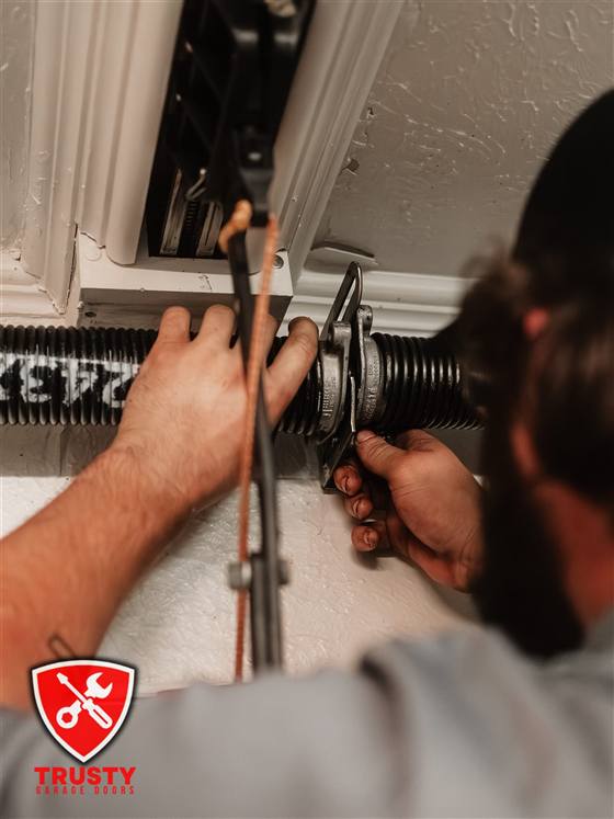 Installing a garage door spring center bracket in Fort Worth, TX