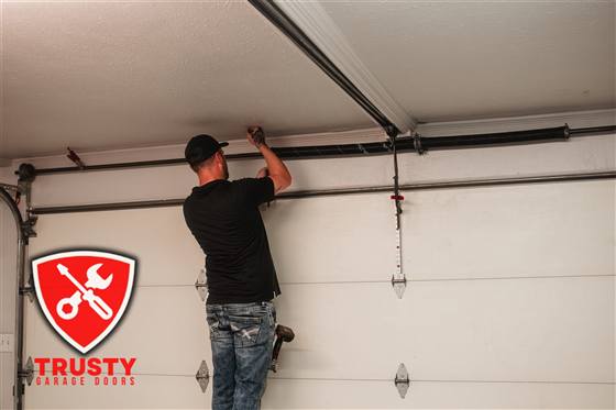 Residential garage door installation by a Trusty Garage Doors technician in Plano, TX